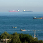 Fishing and cargo container ships sailing in the Strait of Hormuz by Qeshm island, Persian Gulf, Iran. Photo/Getty Images