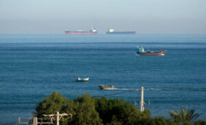 Fishing and cargo container ships sailing in the Strait of Hormuz by Qeshm island, Persian Gulf, Iran. Photo/Getty Images